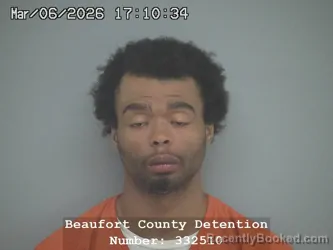 Mugshot of JUSTIN OMAR ROLLINS