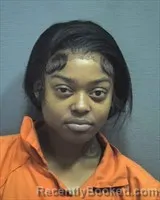 Mugshot of Tionna Latrice Garlington booked in Houston County, Alabama on March 19, 2026