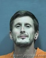 Mugshot of Joshua Adrian Carroll booked in Houston County, Alabama on June 14, 2026