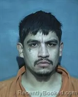 Mugshot of Carlos Enrique Arellano booked in Houston County, Alabama on May 9, 2026