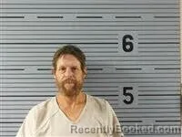 Mugshot of Christopher Aston booked in Jackson County, Alabama on September 4, 2026