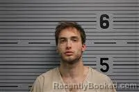 Mugshot of Jacob Isbell booked in Jackson County, Alabama on October 21, 2026