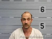 Mugshot of EUGENE EVANS booked in Jackson County, Alabama on July 12, 2026