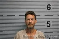 Mugshot of JONATHAN OLSEN booked in Jackson County, Alabama on May 18, 2026