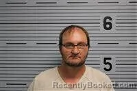 Mugshot of Christopher Lee booked in Jackson County, Alabama on October 4, 2026