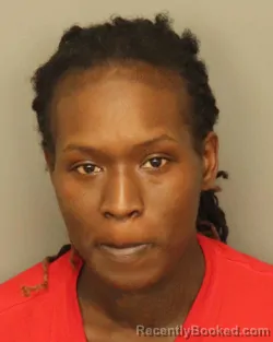 Mugshot of KEISHA RE'NAE EVANS-TOLBERT booked in Jefferson County, Alabama on March 9, 2026