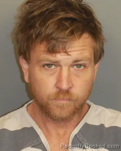 Mugshot of ADAM EZEKIEL HOLLENBACK booked in Jefferson County, Alabama on March 22, 2026