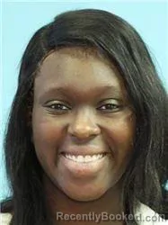 Mugshot of Asia Nikiyiah Lashea Cottingham booked in Jefferson County, Alabama on September 21, 2026