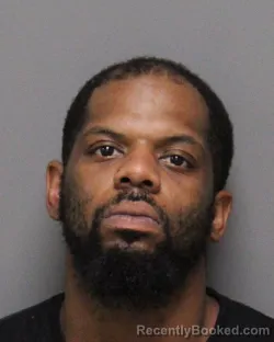 Mugshot of Malik Delvonte Thomas booked in Jefferson County, Alabama on October 7, 2026