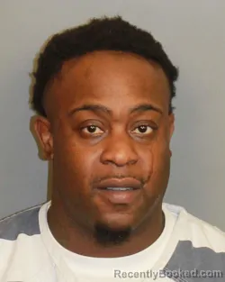 Mugshot of Courtney Deon Lewis booked in Jefferson County, Alabama on October 14, 2026