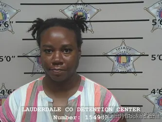 Mugshot of EBONY IYISHIA SWINNEY booked in Lauderdale County, Alabama on June 29, 2026