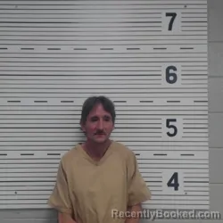 Mugshot of JOHN HARMON CHISOLM