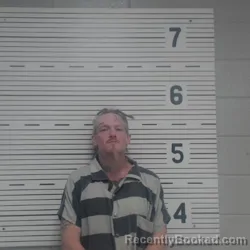 Mugshot of Larry Travis Odell booked in Lawrence County, Alabama on October 26, 2026