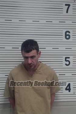 Booking photo from Lawrence County, Alabama