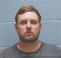 Mugshot of JUSTIN WAYNE SMITH booked in Lee County, Alabama on July 3, 2026