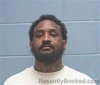 Mugshot of Johnquavious Deshawn Hood booked in Lee County, Alabama on August 12, 2026