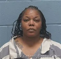 Mugshot of NEFERTITI IESHA HUNTLY booked in Lee County, Alabama on May 3, 2026