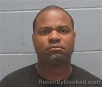Mugshot of TOMARCUS DARNEZ DOWDELL booked in Lee County, Alabama on May 9, 2026