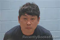 Mugshot of MYEONGJIN JEONG booked in Lee County, Alabama on June 21, 2026