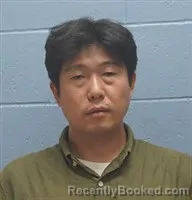 Mugshot of JONGKWAN GU booked in Lee County, Alabama on June 26, 2026