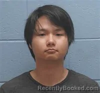 Mugshot of KEVIN GEONHONG MIN booked in Lee County, Alabama on August 2, 2026
