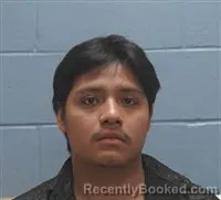 Mugshot of Benjamin Jimenez-Ramirez booked in Lee County, Alabama on August 9, 2026