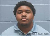 Mugshot of Myles Sledge booked in Lee County, Alabama on August 9, 2026