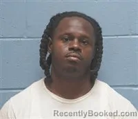 Mugshot of Justin Lashun Rollins booked in Lee County, Alabama on August 12, 2026