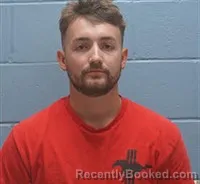 Mugshot of Colby Andrew Thomas booked in Lee County, Alabama on August 23, 2026