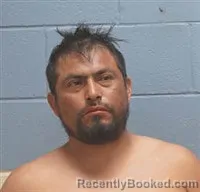 Mugshot of Abel T Ortega booked in Lee County, Alabama on October 2, 2026