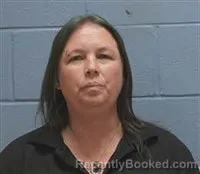 Mugshot of Julie Catherine Green booked in Lee County, Alabama on October 7, 2026