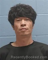 Mugshot of Min Ha Choi booked in Lee County, Alabama on October 9, 2026