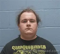 Mugshot of George Alexander Carlisle booked in Lee County, Alabama on October 12, 2026