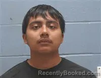 Mugshot of Oswaldo Wilson Andres booked in Lee County, Alabama on October 18, 2026