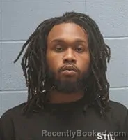 Mugshot of Dennon Joseph Charles booked in Lee County, Alabama on October 23, 2026