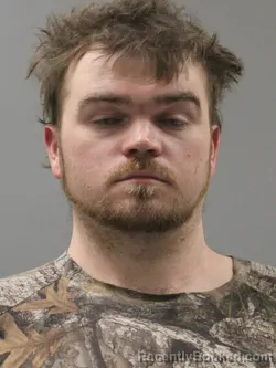Mugshot of JUSTIN LEE MOORE