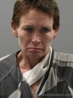 Mugshot of AMANDA HENLEY HOLLOWAY booked in Limestone County, Alabama on April 23, 2026