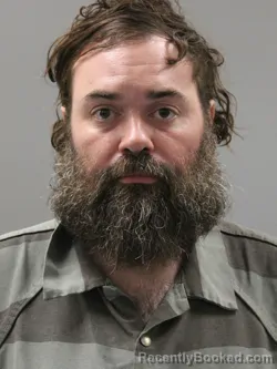 Mugshot of Jonathan Brahe Russell booked in Limestone County, Alabama on August 14, 2026