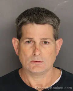 Mugshot of Milton Asbury Carson