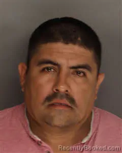 Mugshot of Carlos Ramirez-Lozano