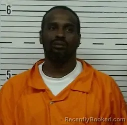 Mugshot of DELOND RHODES