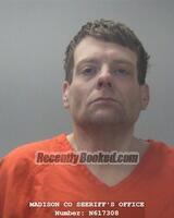Booking photo from Madison County, Alabama