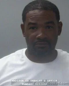 Mugshot of CORNELIUS L MOORE