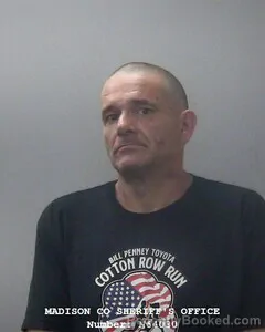 Mugshot of Alva M Bishop booked in Madison County, Alabama on October 1, 2026