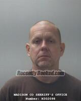 Booking photo from Madison County, Alabama