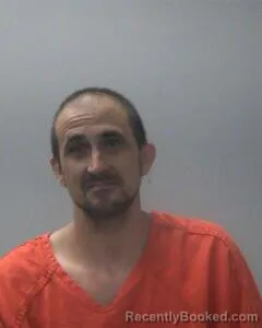 Booking photo from Madison County, Alabama