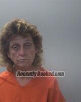 Booking photo from Madison County, Alabama