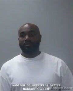 Mugshot of Michaelange W Cagilus booked in Madison County, Alabama on October 25, 2026