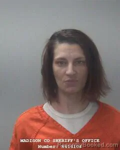 Mugshot of JENNIFER L SNEED booked in Madison County, Alabama on April 30, 2026