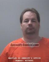 Booking photo from Madison County, Alabama